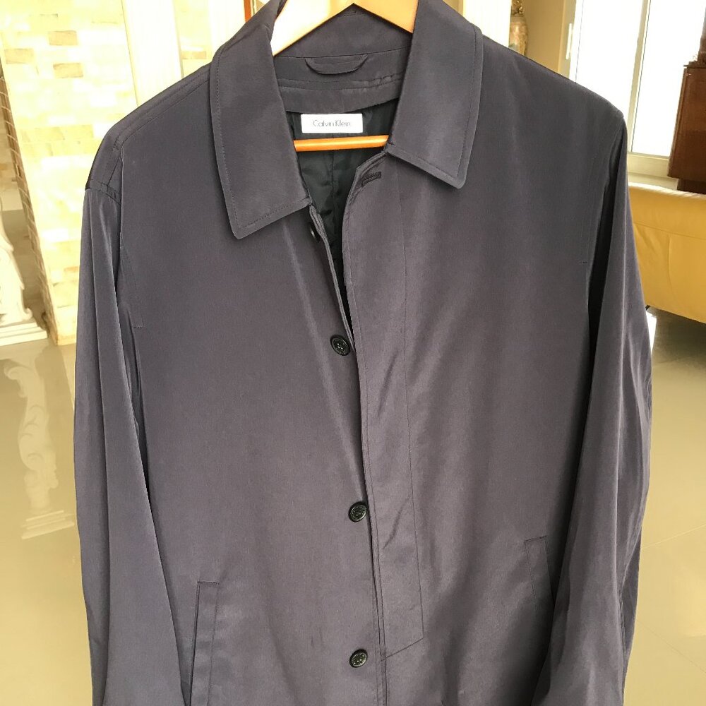 Calvin Klein Overcoat/raincoat. Classic - with zip on warm lining. New. 44L